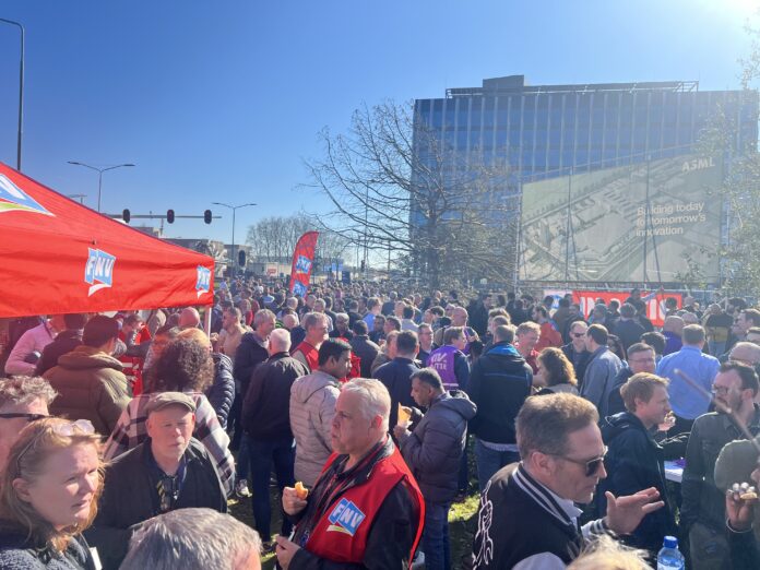 Thousands of ASML employees turnout in front of building 4 to join a walkout. Image credit: Beena Arunraj