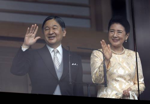 Japanese Emperor Naruhito (L) and Empress Masako wave to well wishers from the balcony of the Imperial Palace in Tokyo, Japan, 23 February 2026. EPA/FRANCK ROBICHON