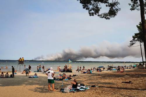 Beach holiday and forest fires
