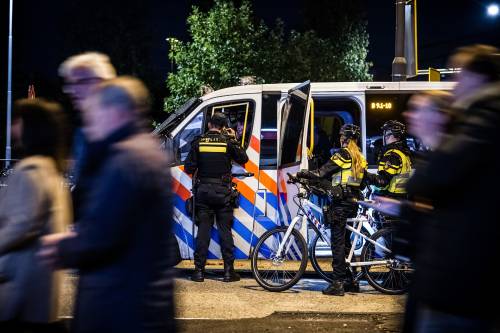 EINDHOVEN – Police outside the stadium in the run-up to the PSV-Napoli football match. The Municipality of Eindhoven has designated part of the city a security risk area. ANP ROB ENGELAAR